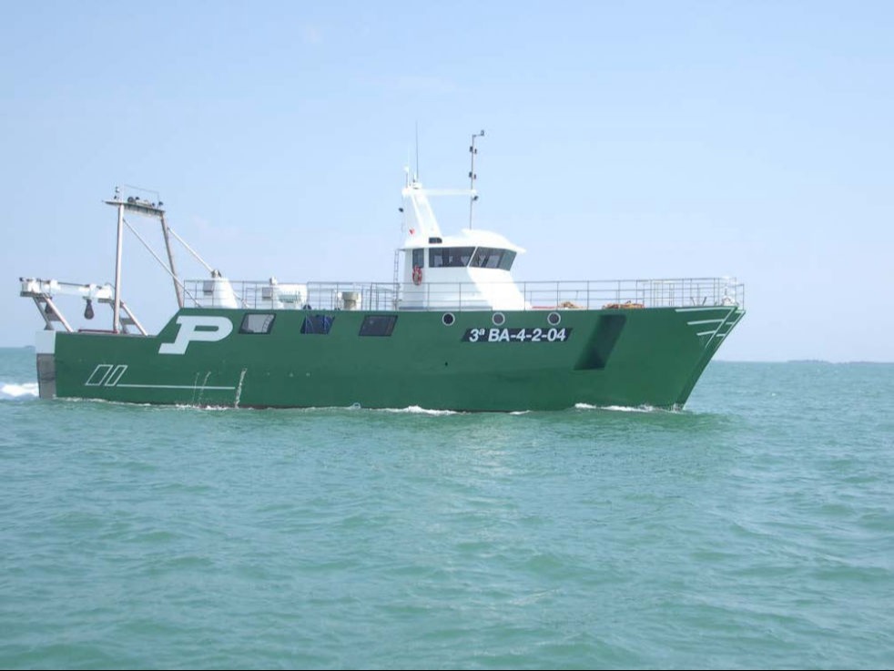 Fishing boat working on sea